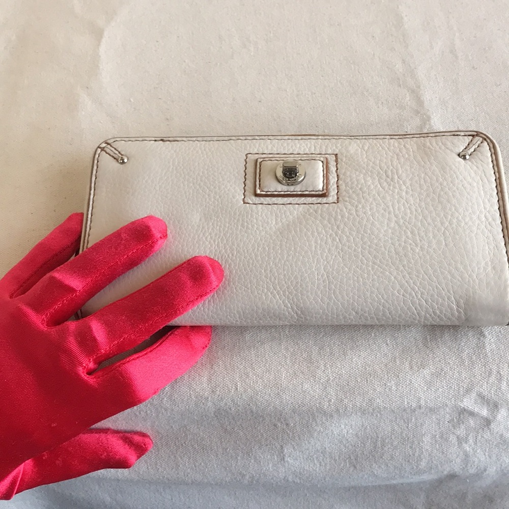Calvin Klein white leather zip around wallet. Clean. Classy.